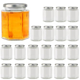 Accguan 10oz hexagon glass jar with silver lid, front view, ideal for gifts.
