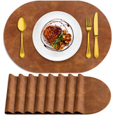 ADRIMER placemats heat resistant oval 12x17 in turmeric brown protect surfaces during meals.