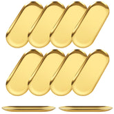 AKOLAFE gold oval serving tray, ideal for appetizers and sushi at gatherings.