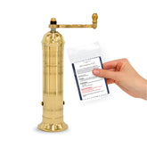 Alexander Home Greek pepper mill top view in brass, ready to grind