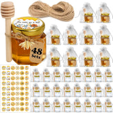 Aliggbent hexagon honey jar with lid and dipper, ideal for wedding favors.