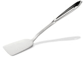 All-Clad 13-inch turner flipping burgers with durable stainless steel for precise control.