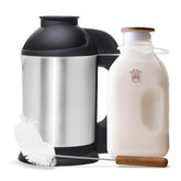 Almond Cow Nut Milk Maker on the counter for fresh plant-based milk.