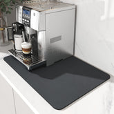 AMOAMI Coffee Mat with stain-hide surface protects counters from spills.