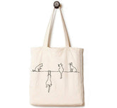 Andes four cats print tote front showcases playful design while carrying daily essentials.