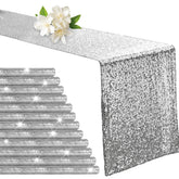 Aormenzy silver sequin table runner laid on a dining table adding sparkle