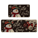 Artoid Mode black snowman kitchen mat 17x29, festive entryway decor and floor protection.