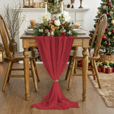 Artoid Mode boho red cheesecloth table runner enhances festive dining and long-table setups.