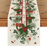 Artoid Mode holly pine cone leaves floral table runner on festive dining setup