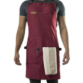 Asaya Chef apron front view showcases durable red canvas and cross-back design for long-lasting cooking comfort.