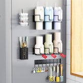 Aufworld magnetic cup holder on fridge keeping Stanley cups accessible with a strong hold.