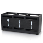 Ayiaren wooden silverware caddy on a counter keeps utensils neatly separated.