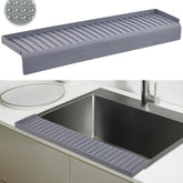 AyNirser sink edge protector with suction base secures along sink edge for splash control.