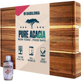 BABILONIA acacia cutting board with handles and extra thick surface for stable chopping.