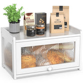 BAMBANG Bamboo Bread Box front window showing fresh loaves and crusts.