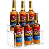 Baosia acrylic coffee syrup rack with six slots for organized, easy-access syrups.