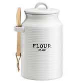 Barnyard Designs flour canister with smooth countertop glaze keeps flour close at hand.