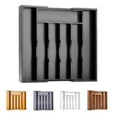 Bellsal expandable bamboo organizer in a drawer keeps utensils neatly organized for quick access