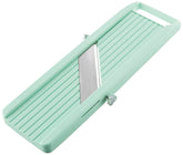 Benriner Vegetable Slicer Green side view highlights compact design for easy prep.
