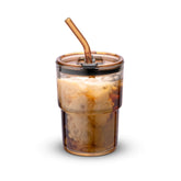 BluePolar 13oz amber tumbler with lid and straw for on-the-go coffee.