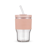 BluePOLAR glass juice bottle with pink sleeve, lid and straw for refreshing cold beverages.