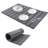 Bmrewax stone drying mat 24x16 gray shown flat for dishes.