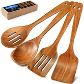BodiCal teak flat spatula 12in gliding smoothly over a skillet with nonstick coating