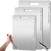 Boenim titanium cutting board front view with vegetables on a non-absorbent surface for clean cuts