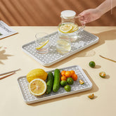 Bonilve small 2 tier drain rack for kitchen sink keeps countertops dry and organized.