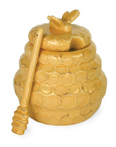 Boston International embossed honey pot with lid and dipper for elegant countertop serving.