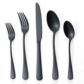 BRIOUT matte black dinner knives with balanced weight for comfortable dining.
