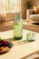 Buminee mouthwash dispenser glass carafe for bathroom use.