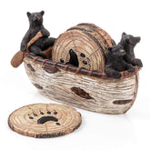 Cabin Obsession bear coaster set in a handmade canoe adds rustic flair