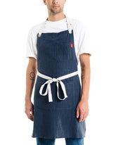 Caldo linen kitchen apron navy front view shows durable fabric and convenient pockets