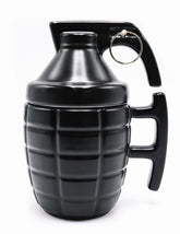Caliber Gourmet grenade mug with lid, a bold ceramic piece for coffee lovers.