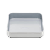Caraway 9-inch square pan top view, highlighting the sleek nonstick surface for easy baking.