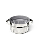 Caraway Steamer small inside sauce pan demonstrates compact, even veggie steaming at home.