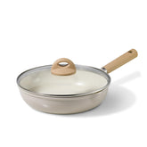 CAROTE 10-inch ceramic pan with lid shows a smooth non-stick surface for easy cooking.