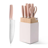 CAROTE knife block set with built-in sharpener in pink ready for quick prep.