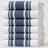 Casa De Lan blue striped towel for quick, effective drying.