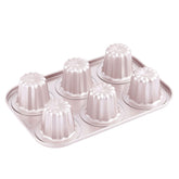 CHEFMADE canele mold pan top view showing sturdy 6-cavity layout for consistent baking.
