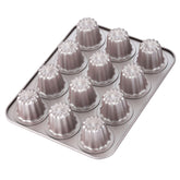 CHEFMADE Canele Mold Pan top view highlights even heat and champagne gold finish.