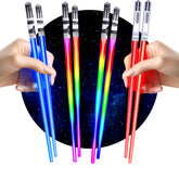 ChopSabers light-up chopsticks glow red and blue for vibrant sushi nights.