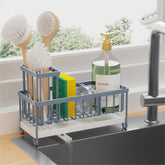 Cisily sponge holder with rotatable spout keeps countertop dry and tidy.