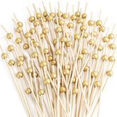 CockStixs gold pearl cocktail picks top view for elegant appetizers