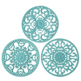 Colinda trivet set turquoise design 1 protects surfaces from heat.