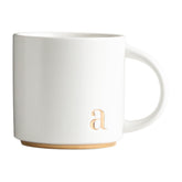 COLLECTIVE HOME monogram mug 15oz with golden initial, perfect for stylish mornings.