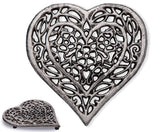 Comfify cast iron heart trivet close-up shows durable recycled-metal construction.