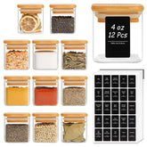 ComSaf 12Pcs glass spice jars with bamboo lids on a tidy counter for quick seasoning.