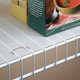 Conimar shelf liner on 16-inch wire shelving creates a smooth, stable surface.
